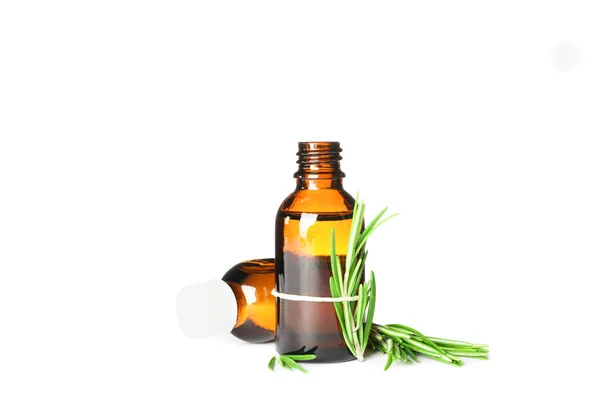 Rosemary oil in jars isolated on white background — Stock Photo, Image