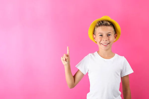 Boy with hat against color background, space for text — Stock Photo, Image