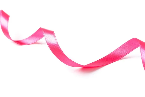 Рожева стрічка ізольована на білому тлі. Подарункова концепція — стокове фото