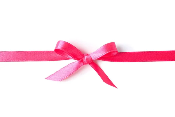 Ruban rose avec arc isolé sur fond blanc. Concept cadeau — Photo