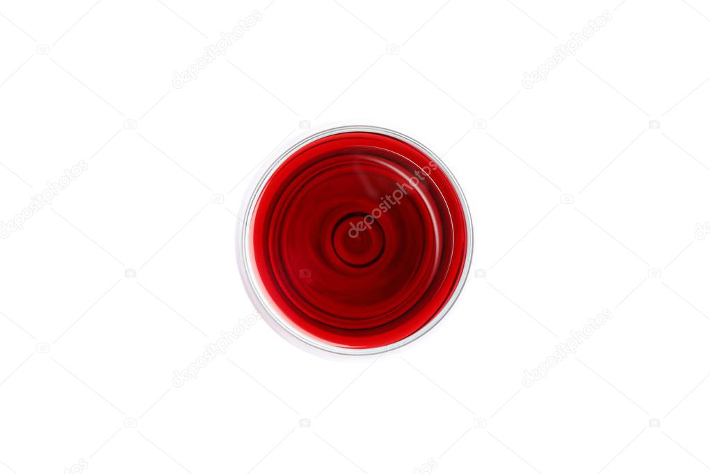 Glass with red wine isolated on white background, top view