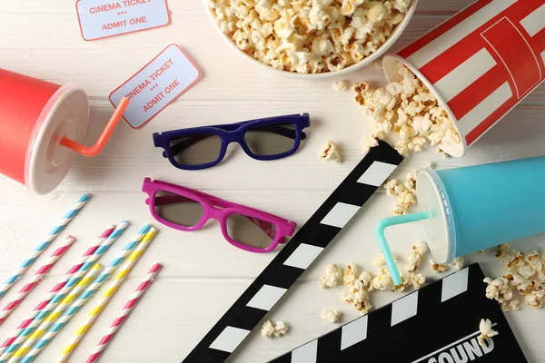 Flat lay. 3d glasses, buckets with popcorn, tickets, clapperboar — Stock Photo, Image