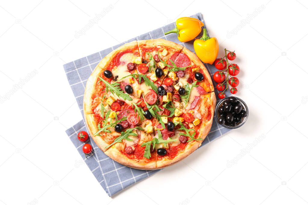 Tasty pizza, ingredients and towel isolated on white background
