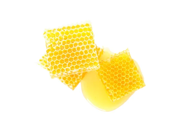 Bitar av Honeycomb isolerade på vit bakgrund, uppifrån — Stockfoto