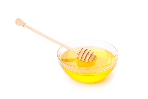 Osa y miel en cuenco de vidrio aislado sobre fondo blanco — Foto de Stock