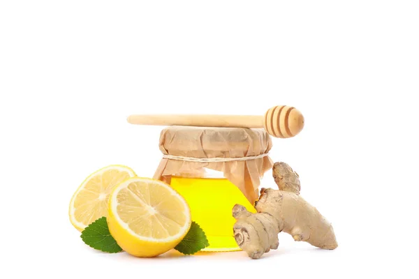 Osa, limones, jengibre y frasco de vidrio con miel aislada en el blanco — Foto de Stock