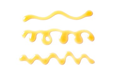 Beyaz arka planda izole tatlı bal lekeleri