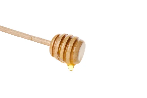 Löffel mit Honig isoliert auf weißem Hintergrund, Nahaufnahme — Stockfoto