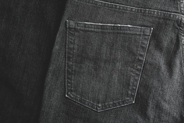 Zwarte jeans getextureerde achtergrond, close-up — Stockfoto