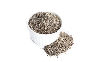 Chia seeds and sauce boat isolated on white background