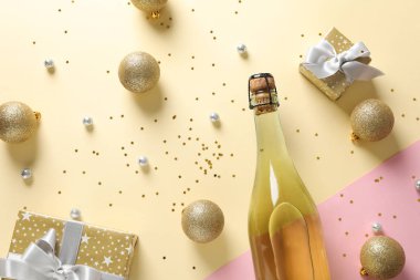Şampanya şişesi ve Noel mücevherleri iki tonda sunulur.