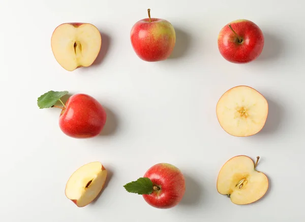 Flat lay with red apples on white background, space for text — Stock Photo, Image
