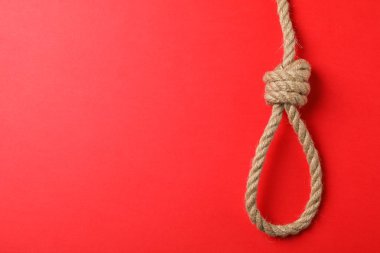 Kırmızı arkaplanda intihar ipi, metin için boşluk