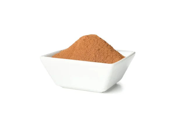 White sauceboat with cinnamon powder isolated on white backgroun — Φωτογραφία Αρχείου