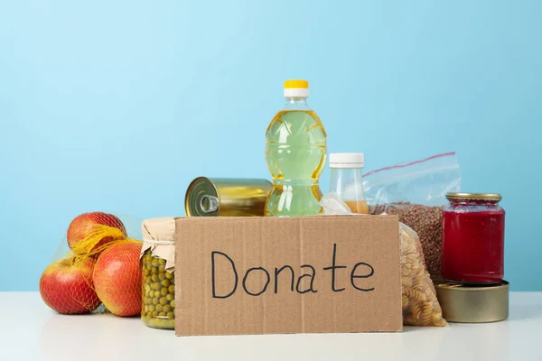 Carro Tienda Con Texto Donar Diferentes Alimentos Sobre Fondo Azul — Foto de Stock