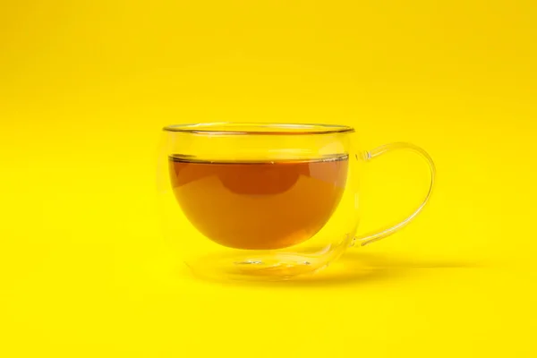 Glass Cup Chamomile Tea Yellow Background — Stock Photo, Image