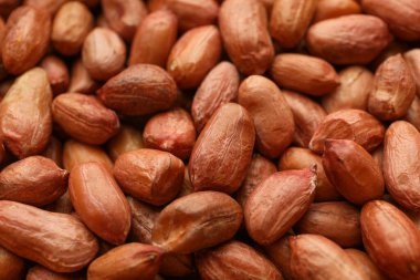 Arka planda leziz fıstıklar, yakın plan. Vitamin yiyeceği.