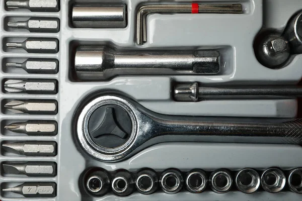 Mechanic tools kit on whole background, close up