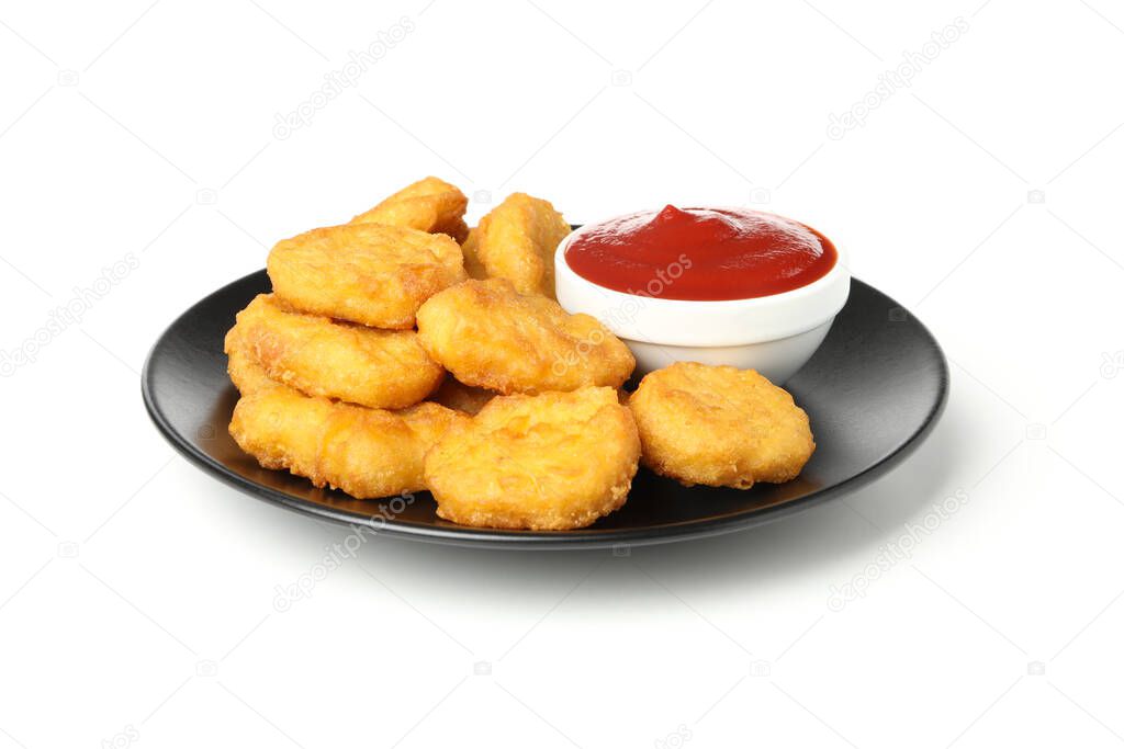 Plate with fried chicken nuggets and ketchup isolated on white background