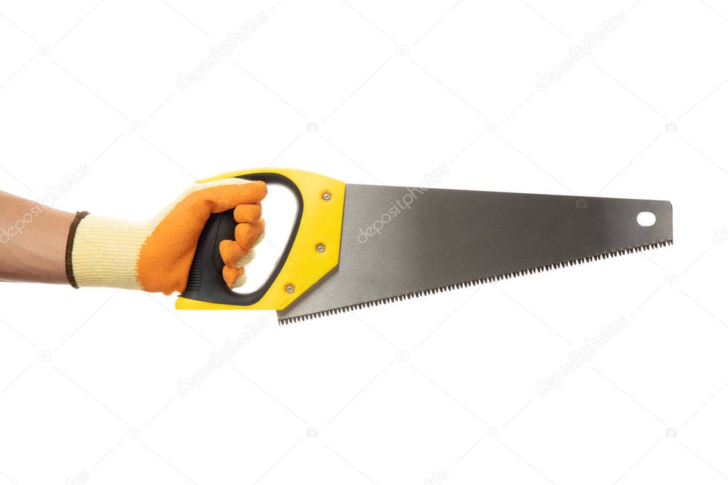 Hand in construction glove holds saw, isolated on white background
