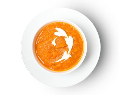 Beyaz arkaplanda izole edilmiş kabak püresi tabakası