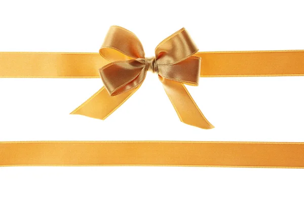 在白色背景上隔离的金色礼物弓 — 图库照片
