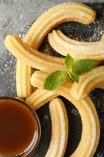 Concepto Almuerzo Dulce Con Churros Sobre Mesa Gris —  Fotos de Stock