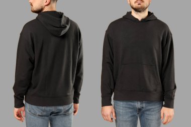 Mockup, sıradan giyinen bir adamın giydiği siyah bir kapüşonluyu gösteriyor.