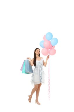 Alışveriş torbaları ve balonları olan bir kadın, beyaz üzerinde izole edilmiş, PNG