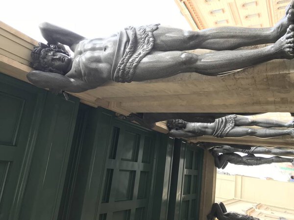 Statue of the Atlantean in building of New Hermitage in center of St.Petersburg