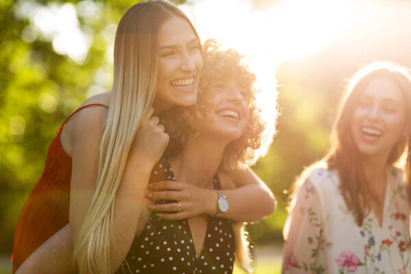 Female friends on sunny summer evening