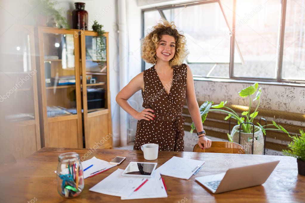 Portrait of confident creative businesswoman in office