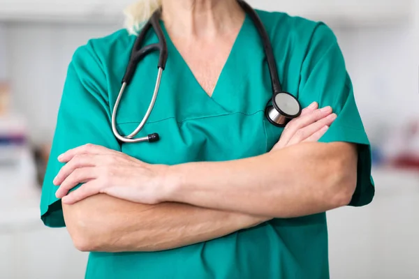 Senior Female Torso Scrubs Stethoscope Her Arms Folded — Stock Photo, Image