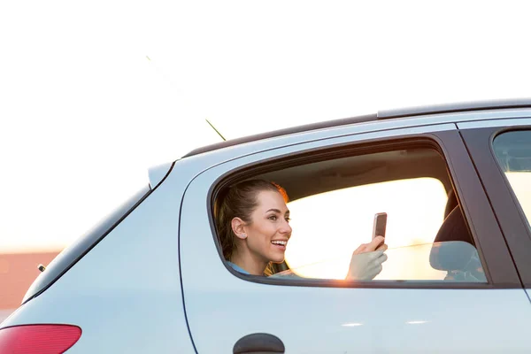 Young Woman Smartphone Back Seat Car — Stock Photo, Image