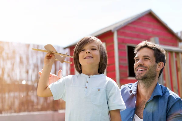 Father Son Playing Paper Toy Airplane Together — Stock Photo, Image