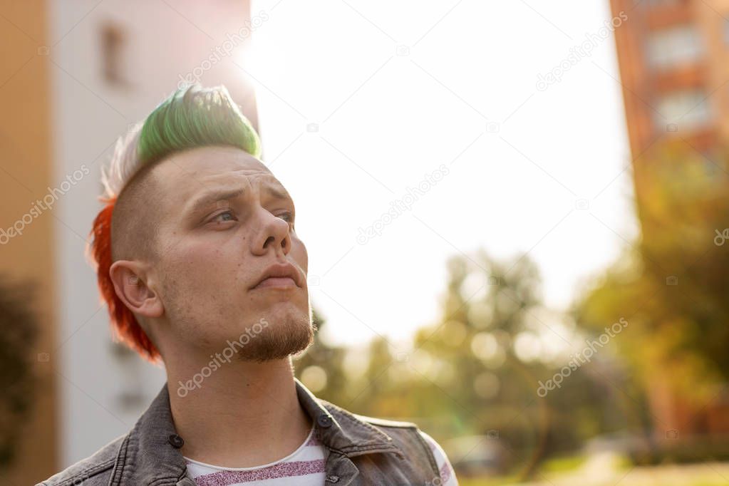 Portrait of a cool young man with mohawk hair