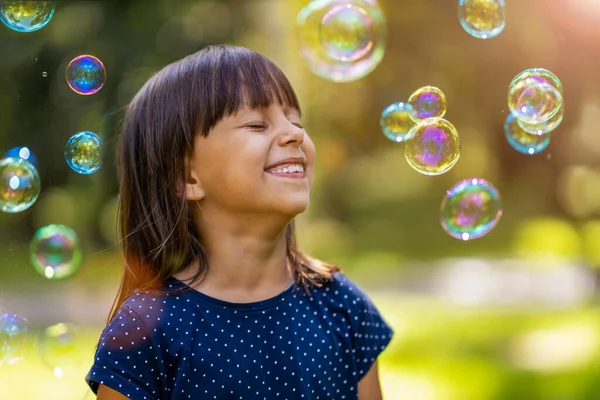 Girl Playing Soap Bubbles Outdoors — Stock Photo, Image