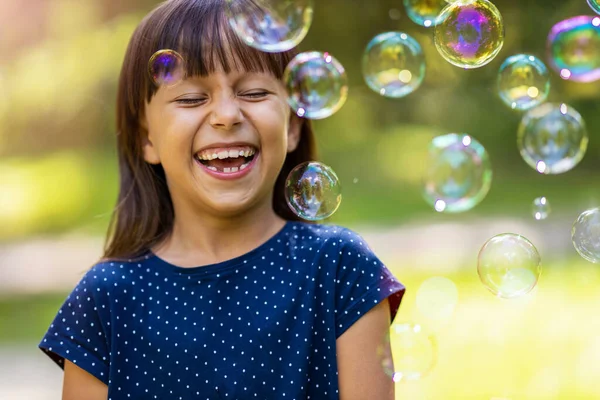 Girl Playing Soap Bubbles Outdoors — Stock Photo, Image