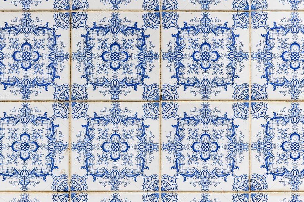 Nazare, Portugal - July 17, 2019: Weathered typical Portuguese blue tiles, aka azulejos