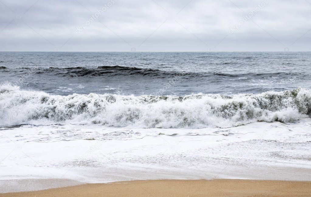 Nazare, Portugal - Crashing waves at the Praia do Norte or North beach at the Praia do Norte or North beach