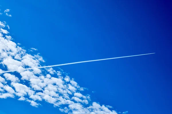 trace of the plane in the sky