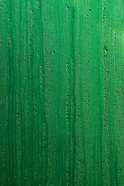 Özgün ve ilginç doku, desen ve arka planını saydam cam, cam yüzeyine yağmur suyu damla matris