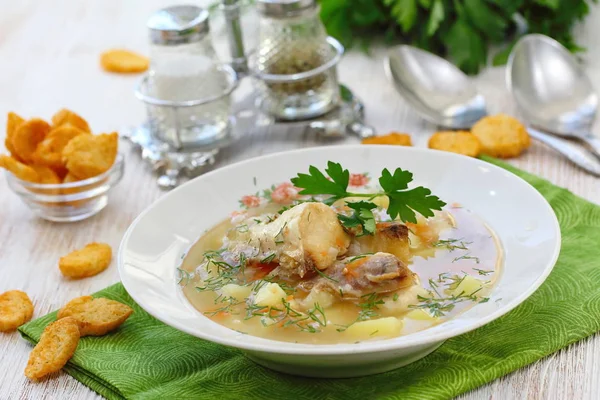 Fish soup. Delicious soup with white fish and vegetables for dinner