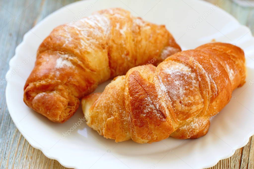 Fresh croissants for breakfast on the table. Continental breakfast