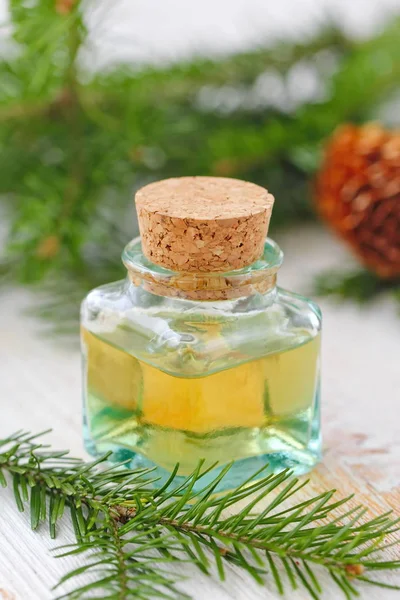 Essential aroma oil witn fir branches and needle smell