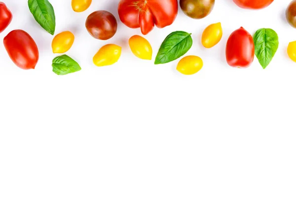 Isolated vegetables mix. Pieces of fresh tomato, cucumber, bell pepper isolated on white background with clipping path