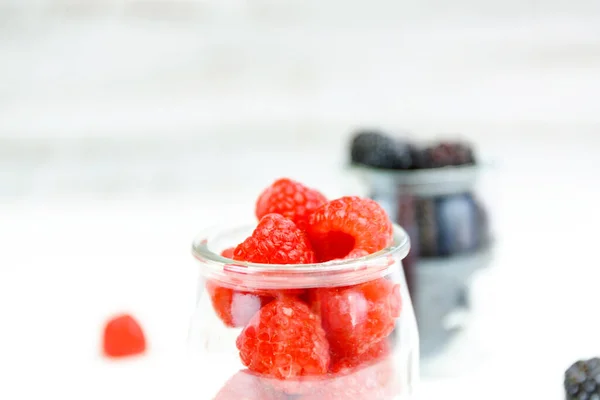 Garden Berries Raspberry Gooseberry Glass Bottles Light Wood Backgrouns Healthy — Stock Photo, Image