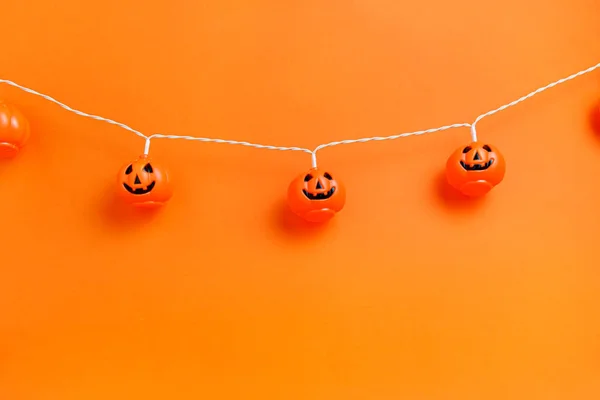 Narancs Háttér Halloween Dekorációk Ijesztő Sütőtök — Stock Fotó