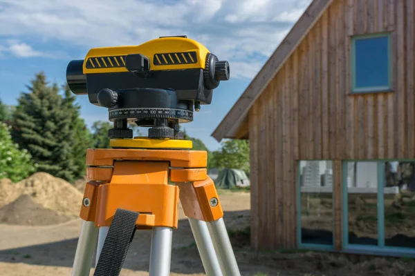 theodolite measuring device for land survey at a construction site