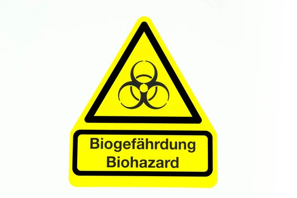 黄色生物危害标志与德国的单词 Biogefaehrdung 意味着生物危害 — 图库照片